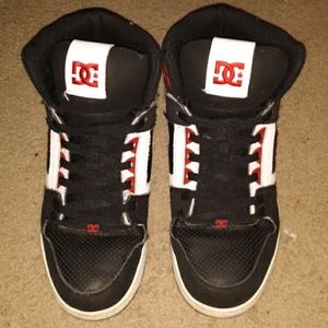 All black DC skating shoes